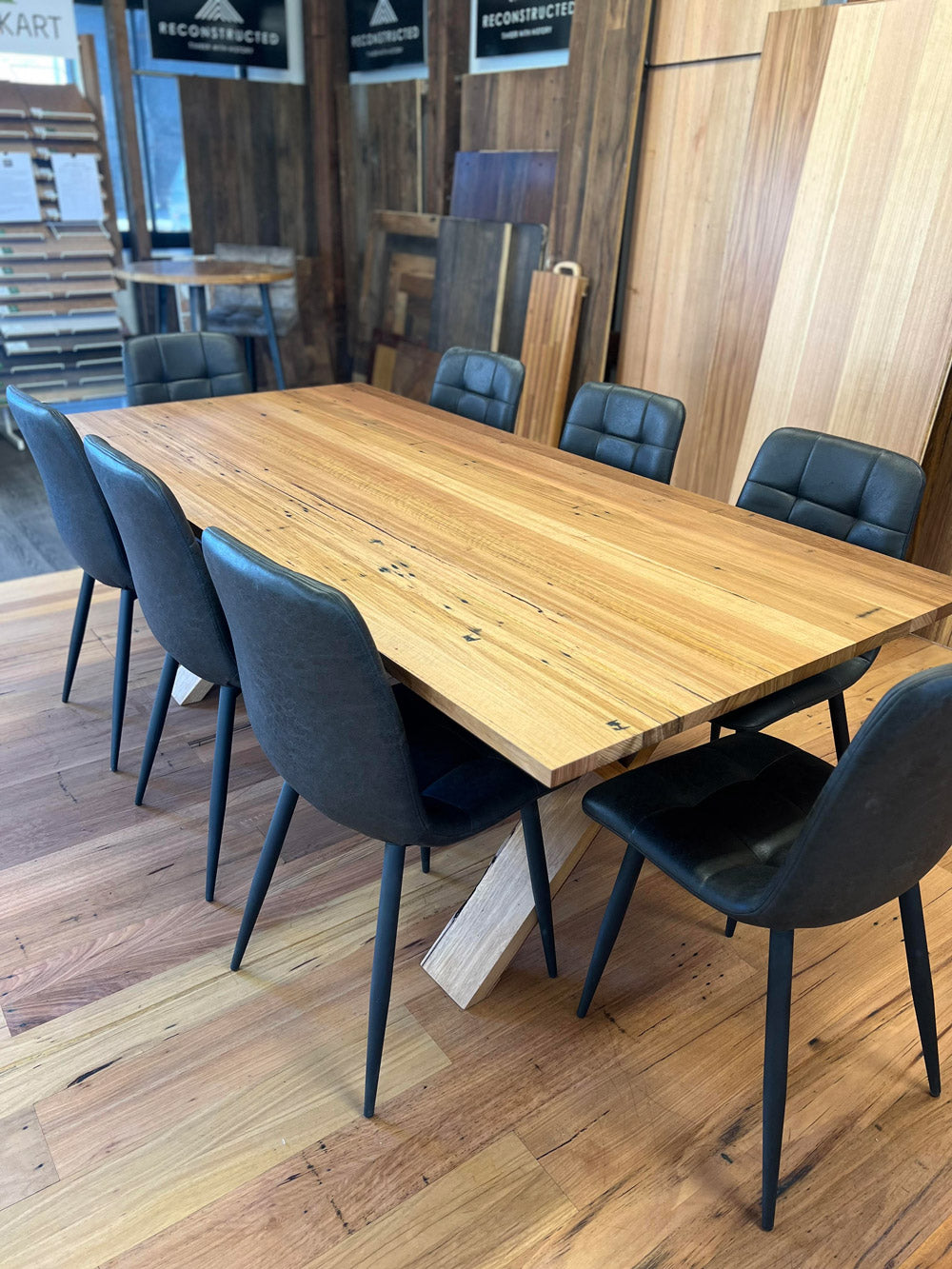 Torquay recycled Messmate dining table with contemporary X-leg design – angled perspective