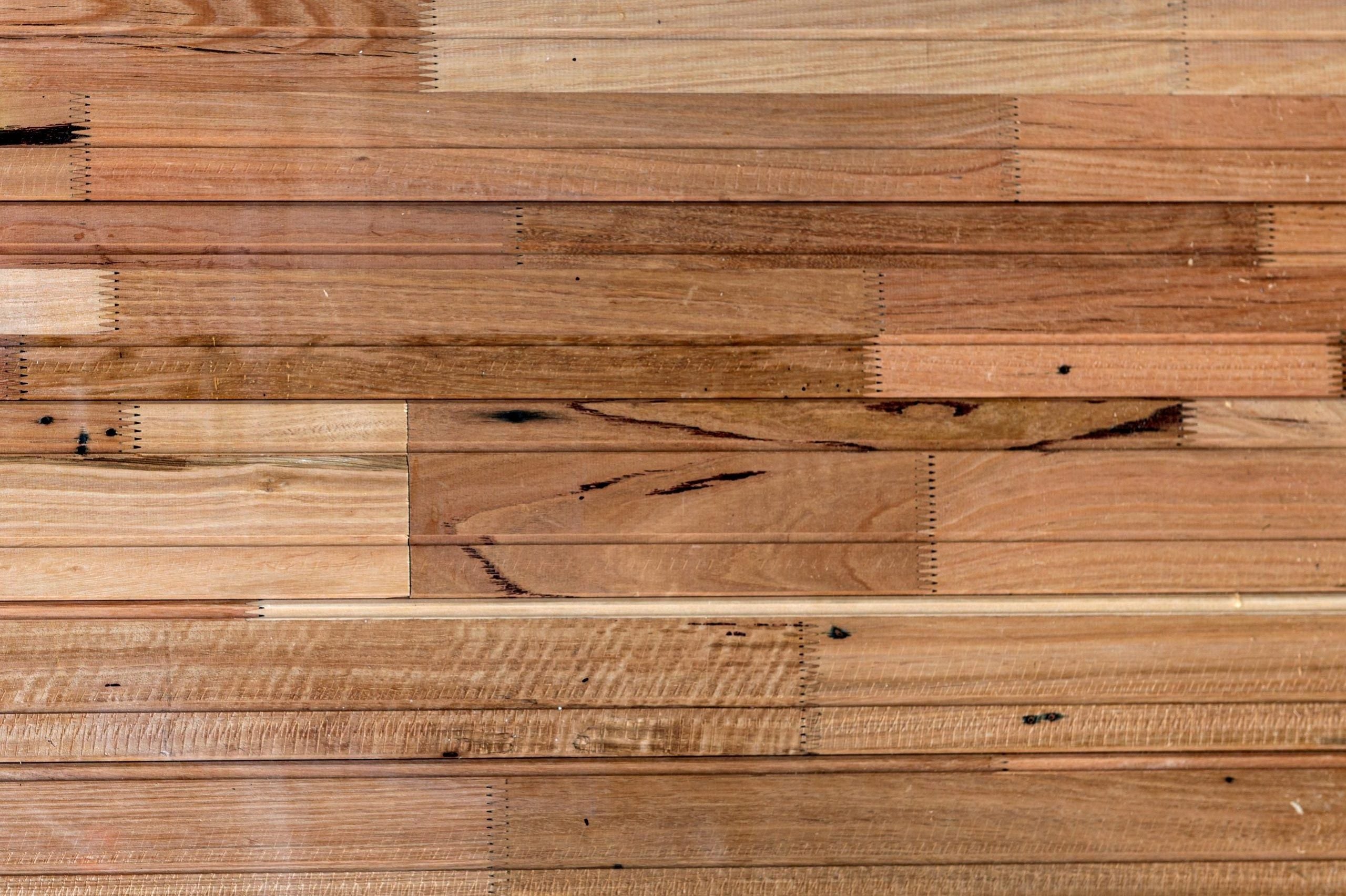 Underside view of reconstructed solid-engineered Australian hardwood flooring showing finger-jointed backing structure