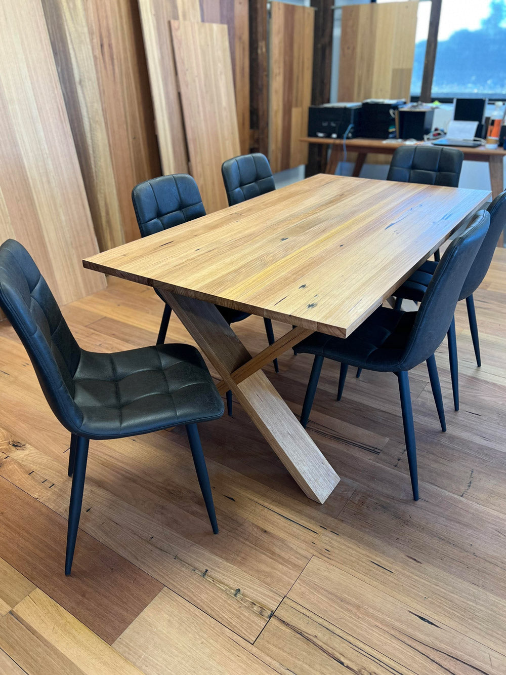 Torquay recycled Messmate dining table with cross-leg base – front angle view