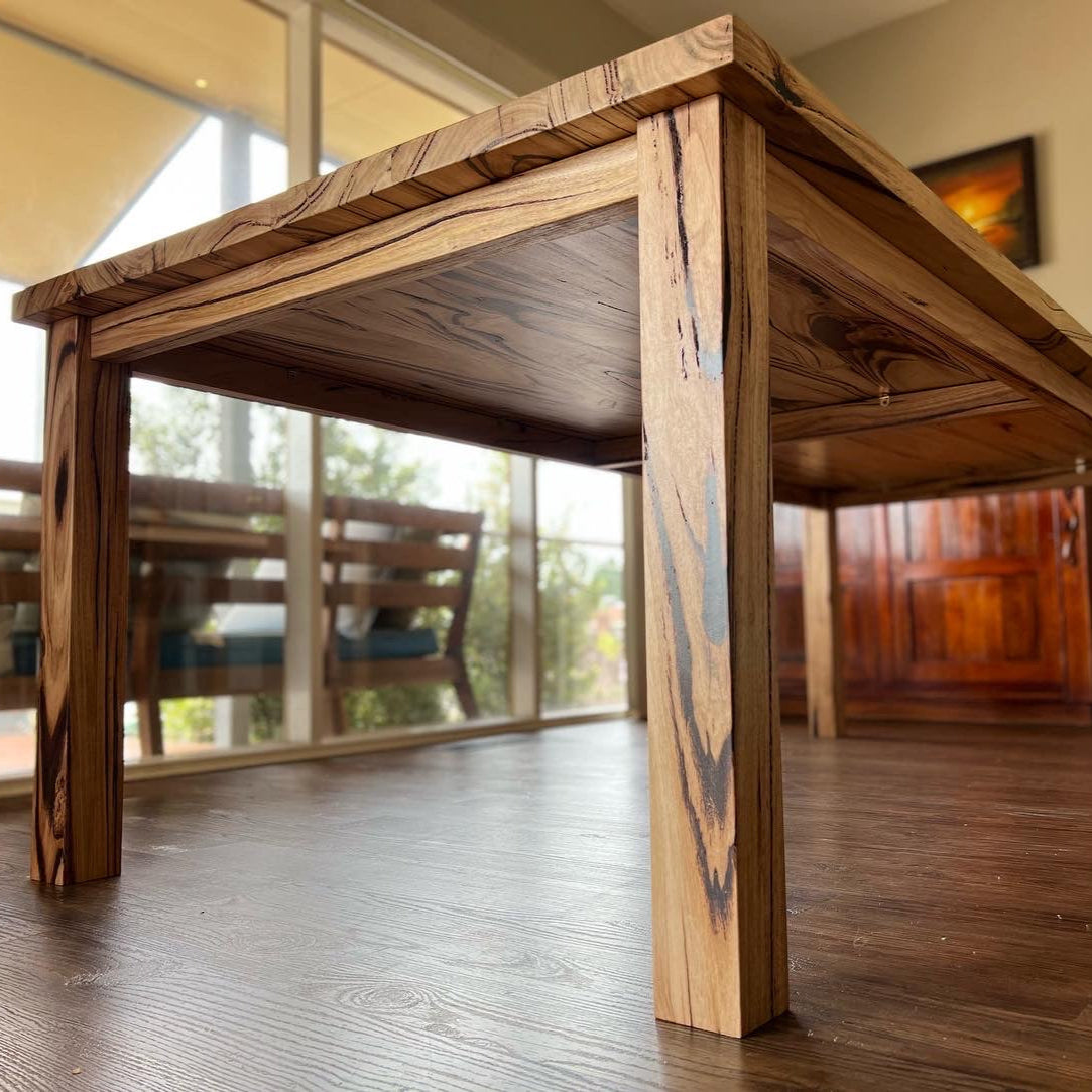 Fairhaven recycled messmate dining table side profile with solid timber legs